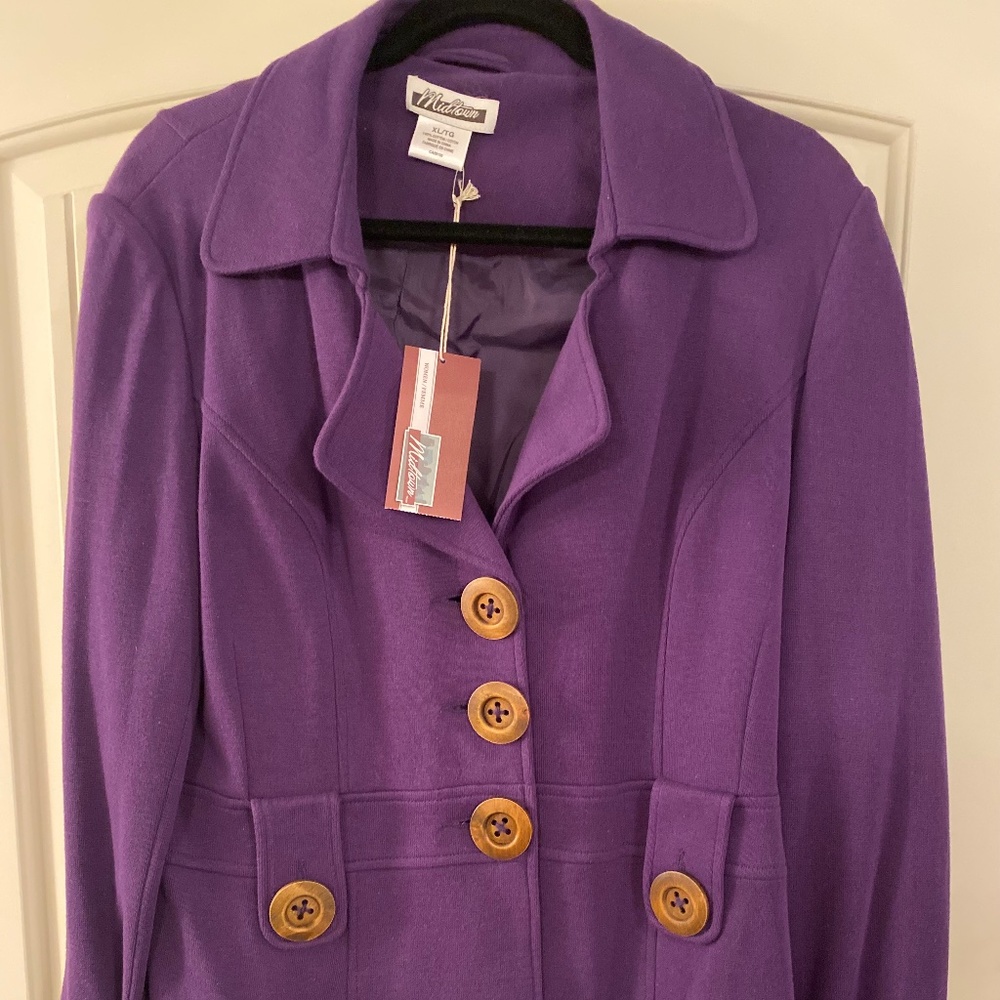 Purple jacket with a big wooden button
